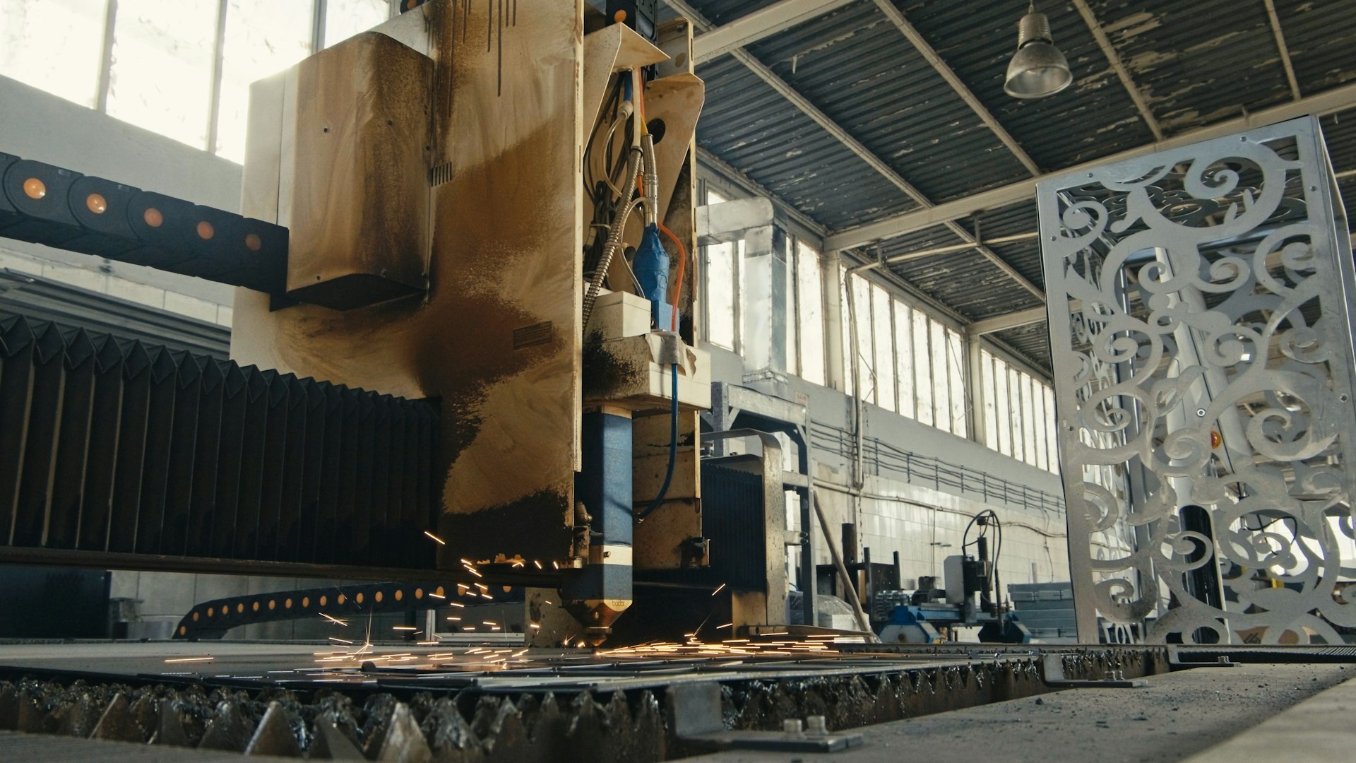 A large metal sculpture inside of a building